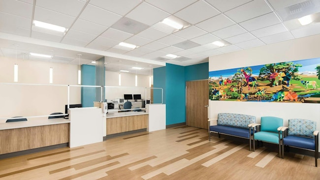 A low-profile recessed LED luminaire such as the Lithonia Lighting BLT provides comfortable lighting in a waiting room. | image by Haley Hill Photography