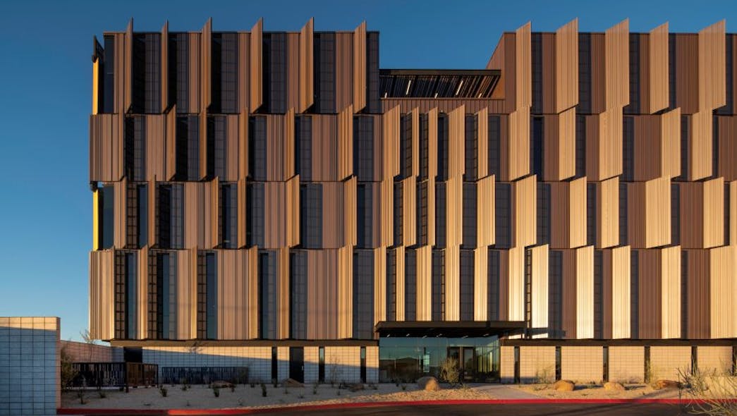 The west fa&ccedil;ade of the Pinal County Attorney&apos;s Office features a perforated metal panel.