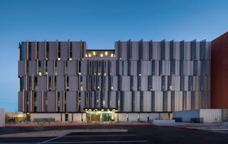 DLR Group designed the facade of the Pinal County Attorney&apos;s Office to self-shade, managing glare and solar heat gain in the harsh Arizona climate.