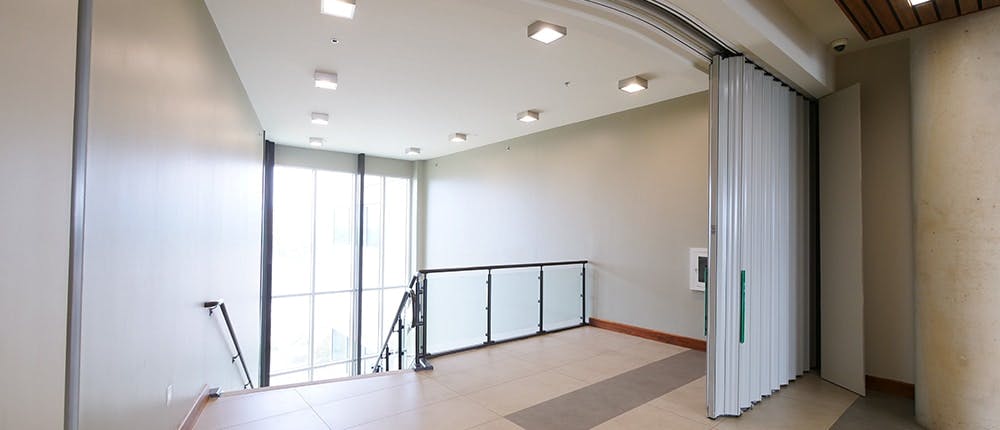 FireGuard AFG sliding fire door offers an unimpeded flow of pedestrian traffic, open plan designs and advanced access control features. The popular wide-span opening is approved for all applications, except Group H occupancies. www.wondoor.com