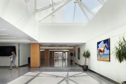 Public access from the plaza level into the underground concourse is provided via a stairwell within the northern glass lantern that features an art gallery featuring local artists.