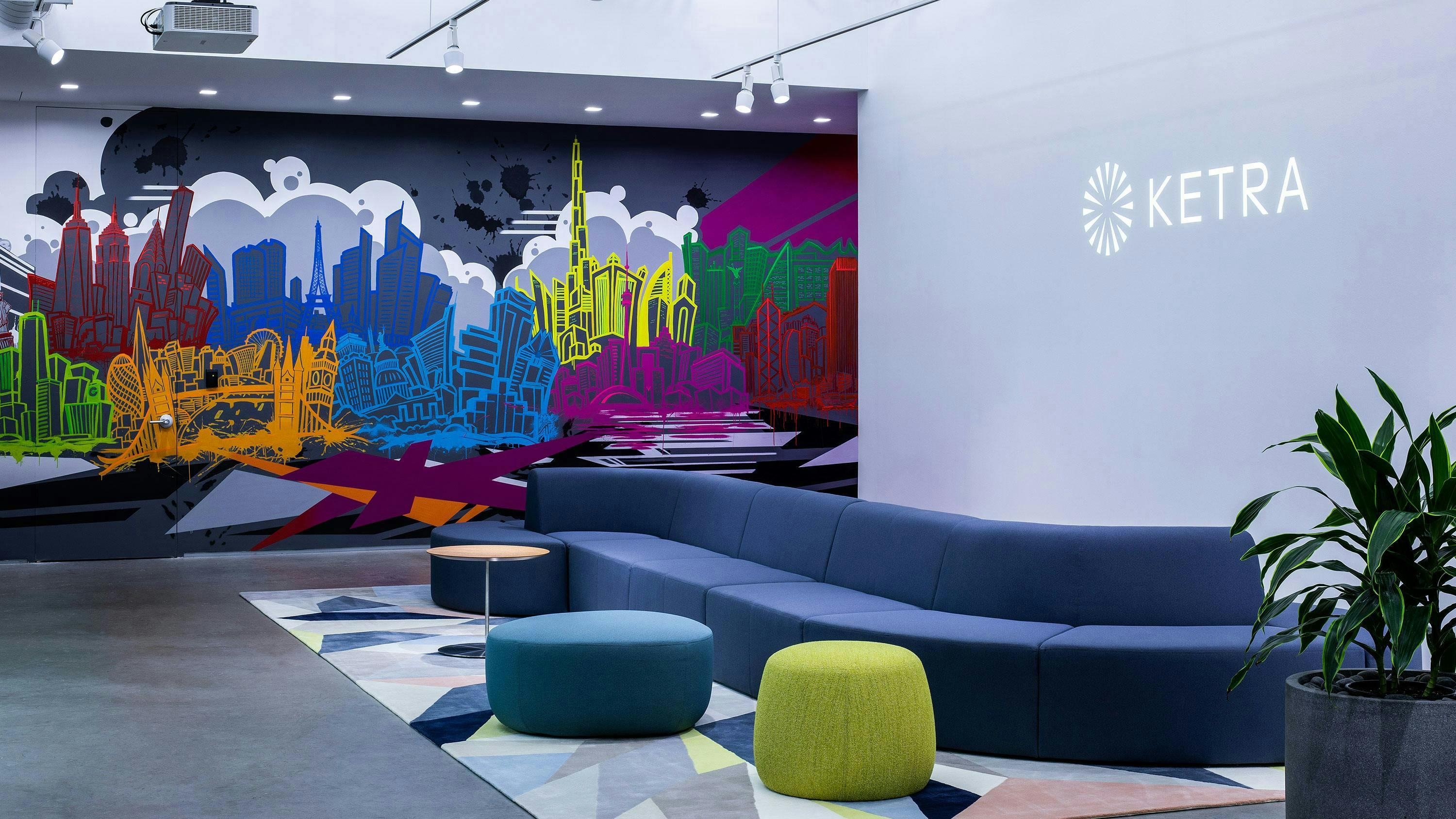 A mural by hometown artist Aaron Darling at Ketra&rsquo;s headquarters in Austin depicts skylines across the world where Lutron has offices.