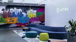 A mural by hometown artist Aaron Darling at Ketra’s headquarters in Austin depicts skylines across the world where Lutron has offices.
