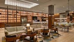 The coffered ceiling highlights the modern spindle staircase. Reminiscent of a skylight, it is illuminated by LED tape light concealed in the architectural ceiling cove. The coffered ceiling highlights the modern spindle staircase. Reminiscent of a skylight, it is illuminated by LED tape light concealed in the architectural ceiling cove.