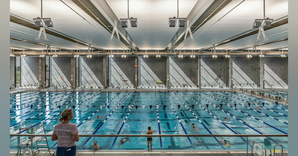 Natatorium Building Eastside Recreation Center's lighting design illuminates a facade and ...