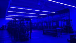 Indigo-Clean technology in use at Chelsea High School's weight room, in Michigan. Exercise facilities have been considered high-risk for transmission of harmful bacteria because of their enclosed environment, shared equipment, and close contact between users and staff. Clinically proven to reduce harmful bacteria, 405-nanometer lighting technology can be installed to provide continuous disinfection. Indigo-Clean technology in use at Chelsea High School's weight room, in Michigan. Exercise facilities have been considered high-risk for transmission of harmful bacteria because of their enclosed environment, shared equipment, and close contact between users and staff. Clinically proven to reduce harmful bacteria, 405-nanometer lighting technology can be installed to provide continuous disinfection.