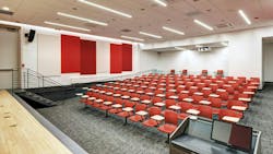 To light the lecture hall, overhead recessed downlights, cove lighting along the aisles, and decorative linear LEDs were incorporated into acoustic panels on the side walls. To light the lecture hall, overhead recessed downlights, cove lighting along the aisles, and decorative linear LEDs were incorporated into acoustic panels on the side walls.