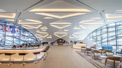 Interior with ceiling finished in CastWorks Glass Fiber Reinforced GYpsum with geometric shapes and integrated lighting.