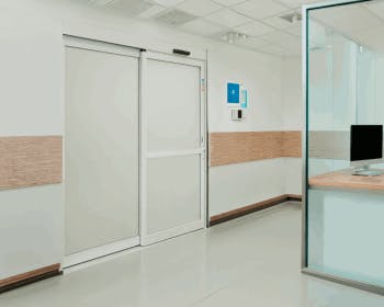 Hospital interior with Behavioral Health Sliding Doors in closed position.