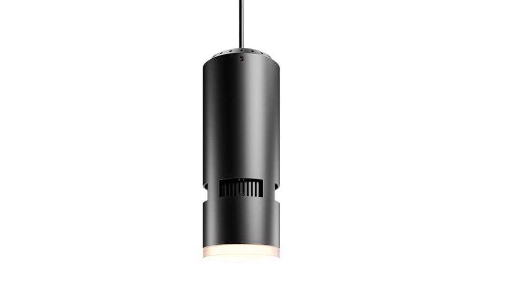 Black cylinder lighting fixture suspended by black cord.