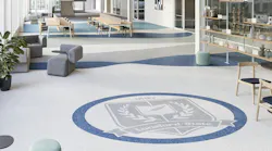 Interior with Johnsonite Pearla Rubber Tile flooring in white, blue, and grey that resembles terrazzo flooring.