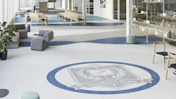 Interior with Johnsonite Pearla Rubber Tile flooring in white, blue, and grey that resembles terrazzo flooring.