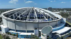Damaged Tropicana Field roof showing shredded roof fabric and missing PTFE panels.