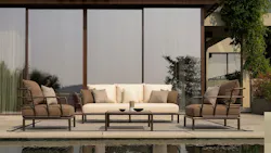 Outdoor living poolside area with Saint Martin chairs and couch.