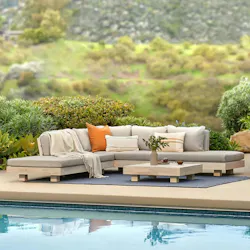 Outdoor poolside lounge-forward sectional in beach sand.