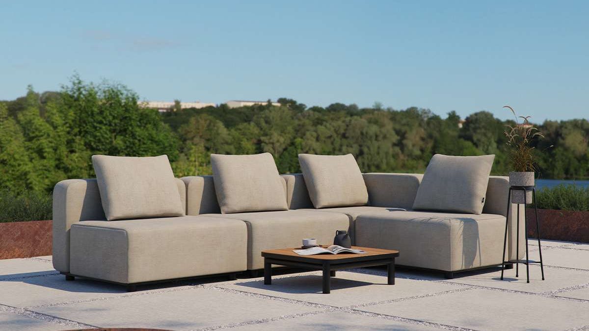 Poolside outdoor living space with grey Cobana lounge sofa.