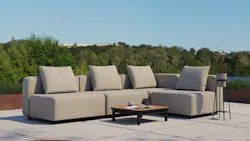 Poolside outdoor living space with grey Cobana lounge sofa.