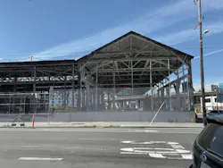 Frame of San Francisco Flower Market with original exterior removed.