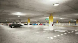 Parking garage interior with several VCPG Ultimate LED parking garage luminaires.