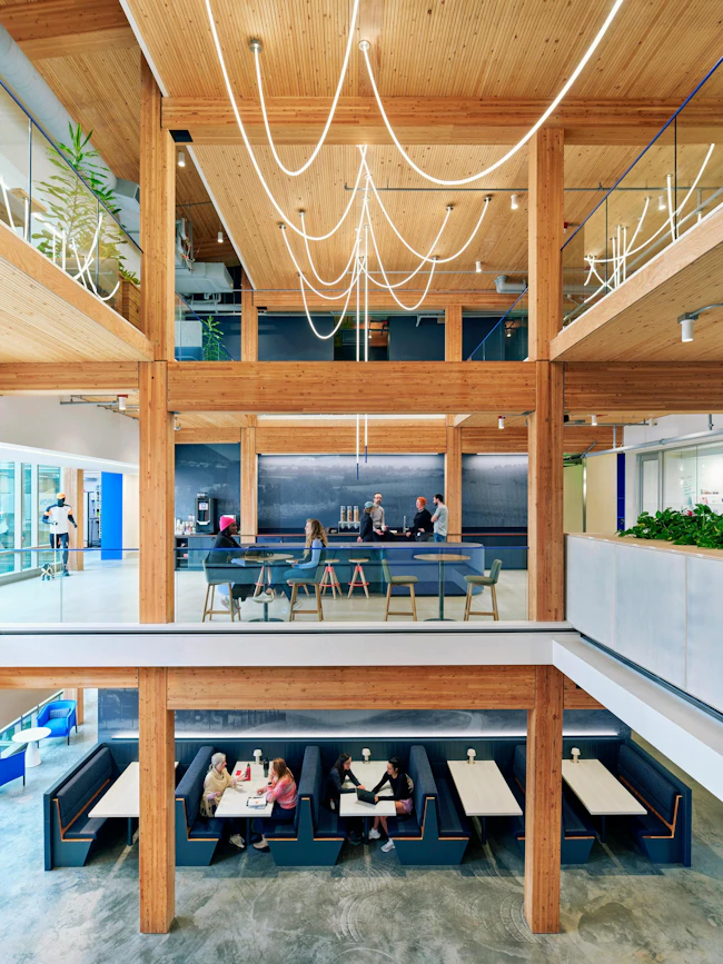 Three-story hybrid mass timber structure in the Brooks Running headquarters designed by NBBJ.