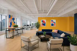 Commercial open office with suspended ID+ 2.5' Pure Cylinder luminaires.