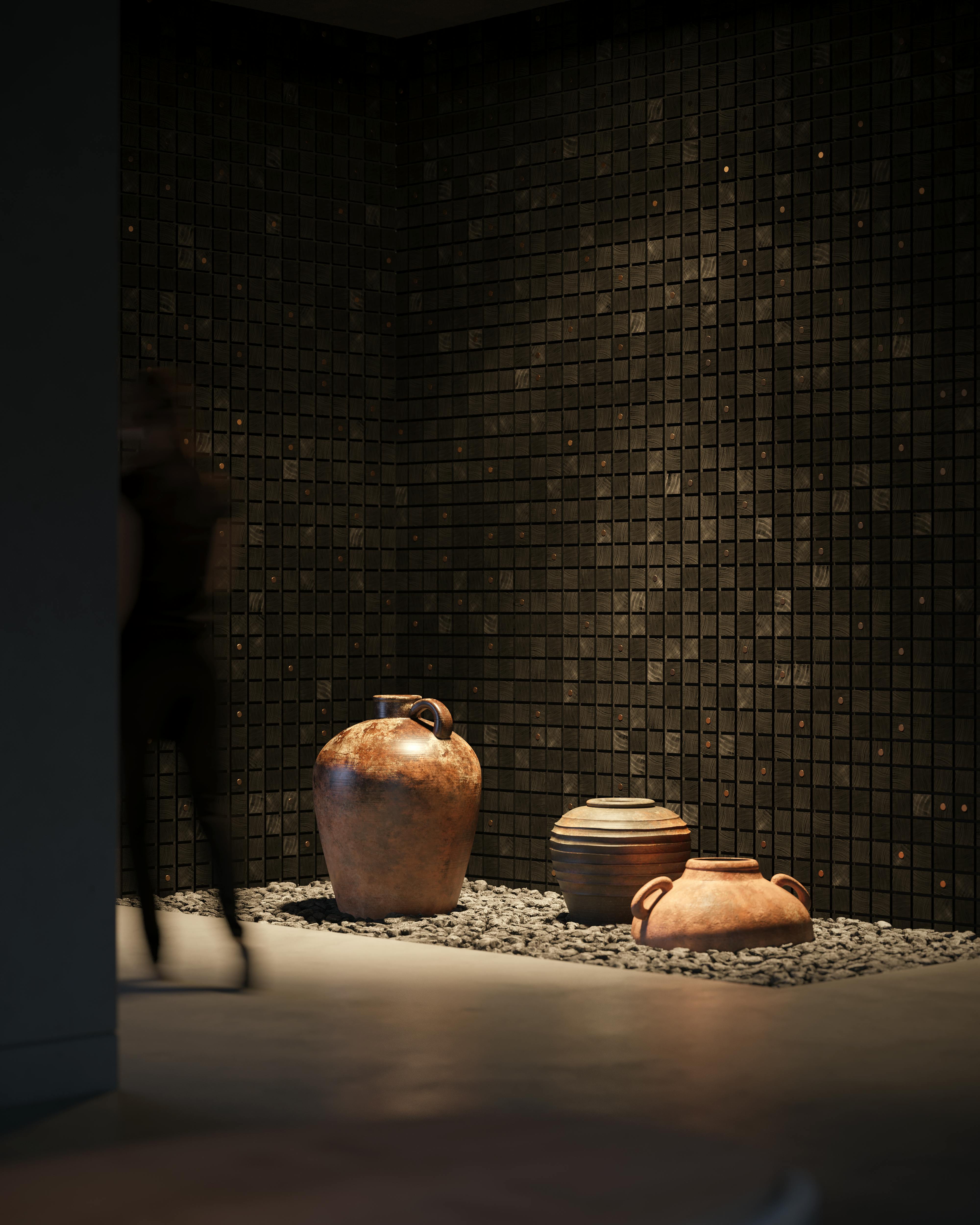 room with rocks, pottery, and sagrado wallcovering from WVH.