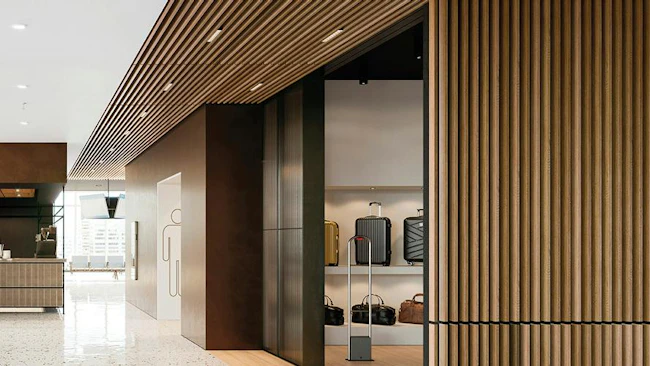 Grille Forte ceiling panels with integrated linear USAI lighting.
